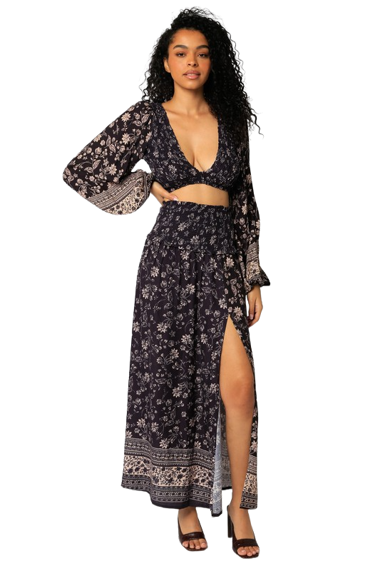 Midnight‑blue floral smocked midi skirt with high‑leg slit and flowing drape