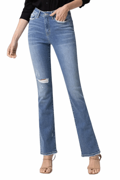 High‑rise mid‑blue mini bootcut jeans with intentional distressing and a subtle flare.