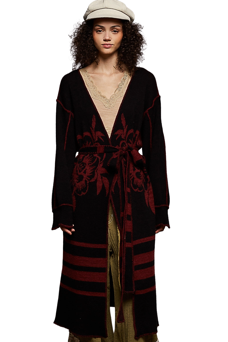 Black and red bohemian floral long cardigan with exposed stitching and waist belt.