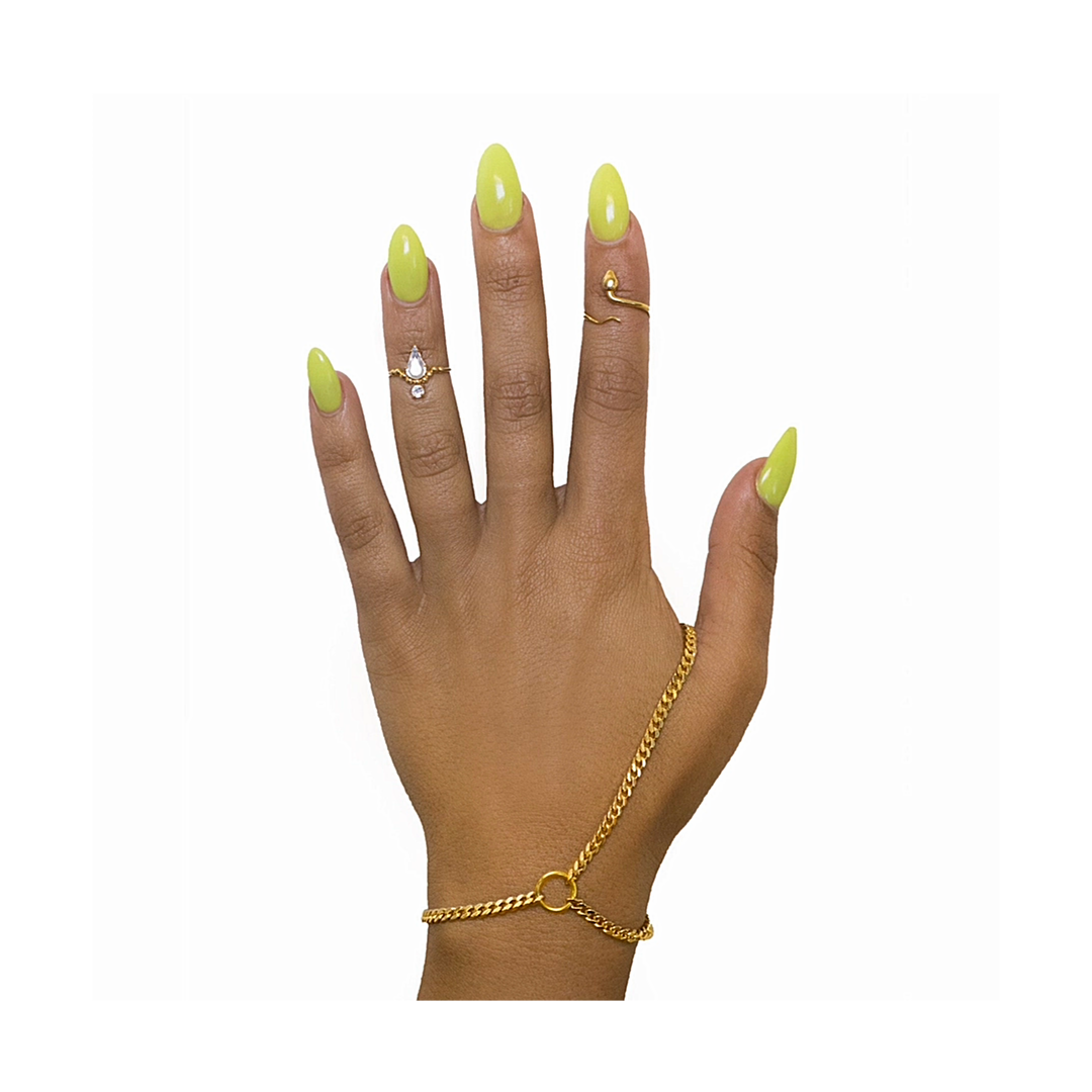 18K gold‑plated hand chain draping from wrist to finger in a minimalist design.