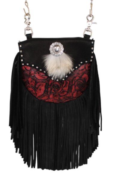 Black deerskin hip bag with red rose accent, white coyote fur, silver concho, and long fringe.