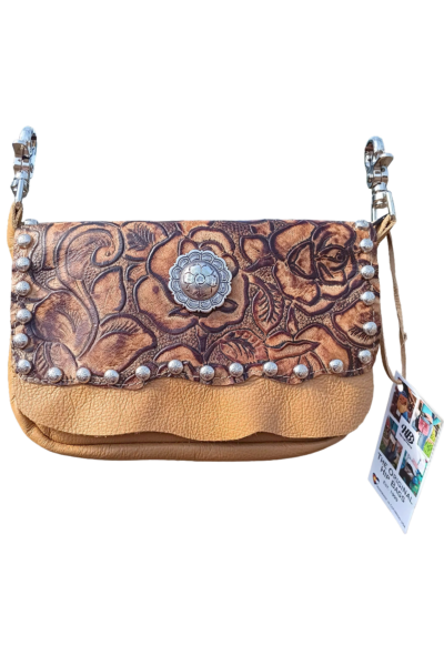 Buckskin hip bag with metallic golden‑rose leather print, silver studs, and circular silver concho.