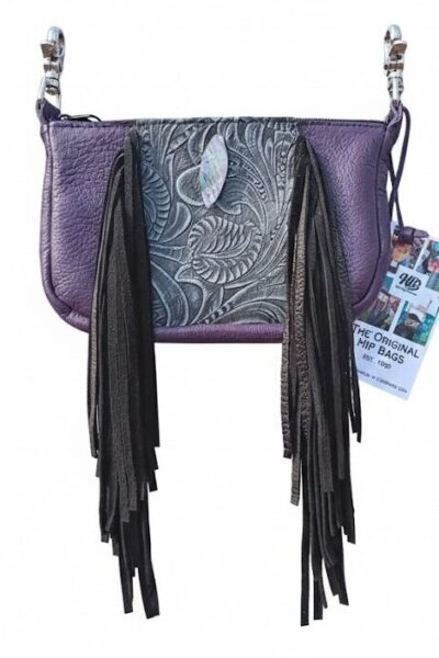 Purple leather hip bag with iridescent Mother of Pearl facial band, long fringe, and adjustable strap.