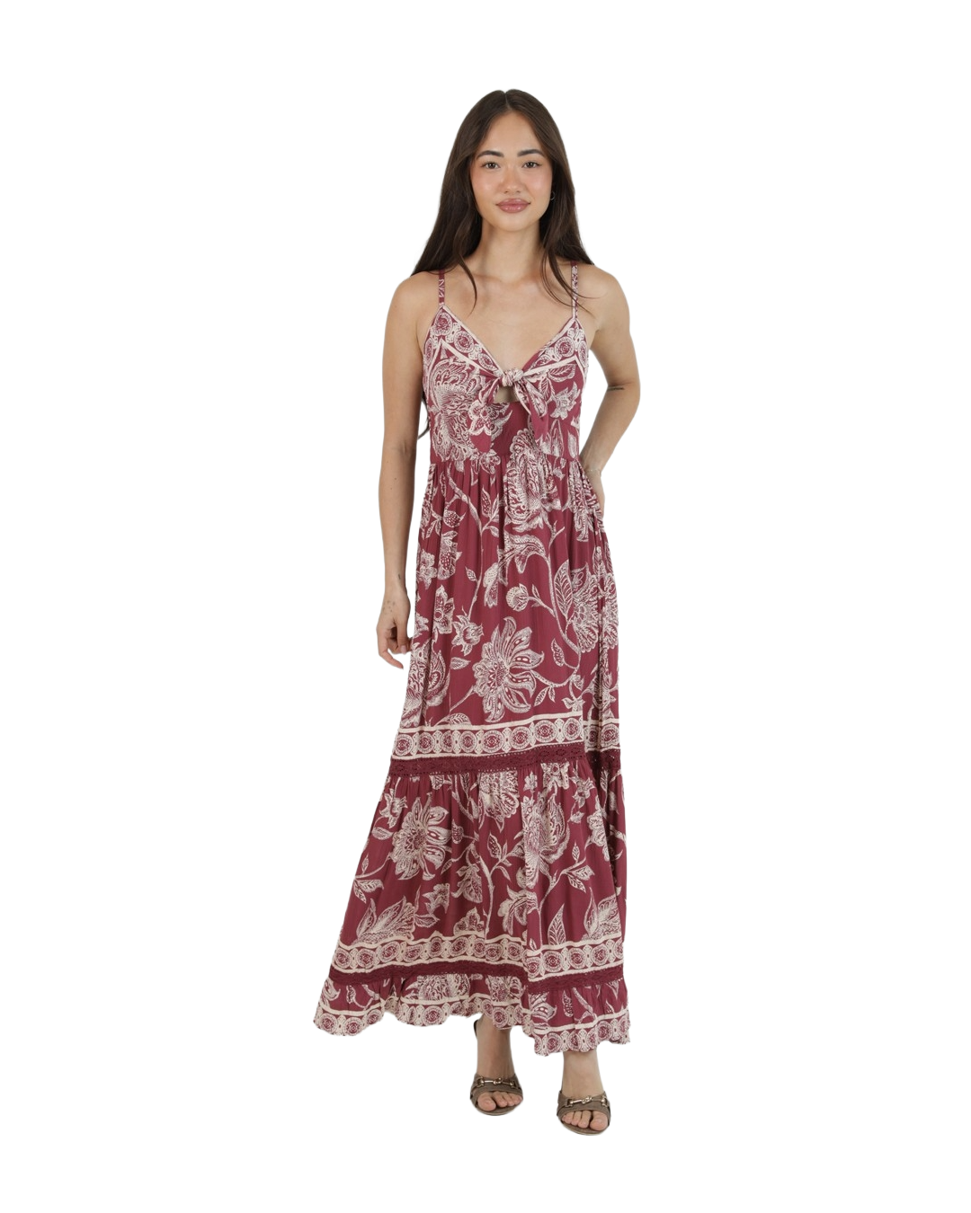 Wine‑colored tiered maxi dress with a floral and geometric print, tie‑bust keyhole detail, and adjustable spaghetti straps.
